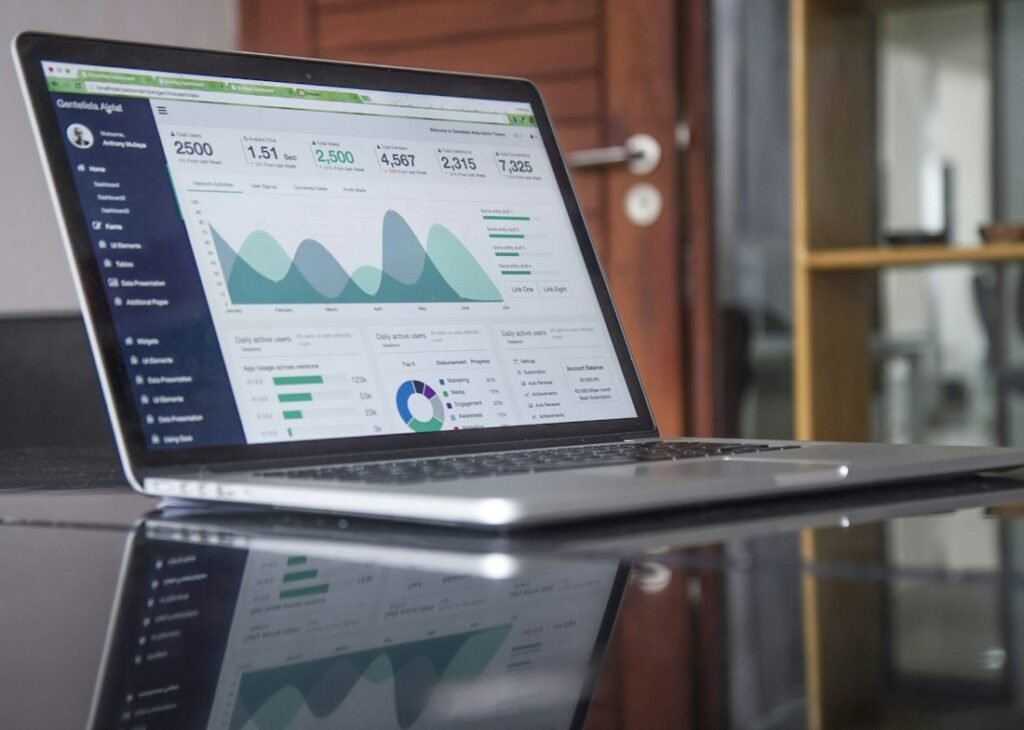 Website analytics dashboard with traffic charts on a laptop
